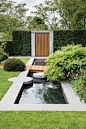 artistic water feature using concrete and wood | http://adamchristopherdesign.co.uk Architectural Landscape Design