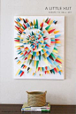 DIY tutorial: use paper scraps to make wall art  -- from A Little Hut