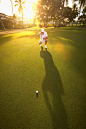 Caucasian golfer preparing on putting green by Gable Denims on 500px