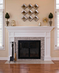 Large transitional formal and enclosed medium tone wood floor and brown floor living room photo in DC Metro with white walls, a standard fireplace, a tile fireplace and a tv stand