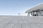 3d渲染未来建筑与空混凝土地板，汽车介绍。