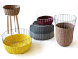 "The Bask collection is a mix between a modern, wire-framed basket and a traditionally-woven basket. After visiting a company in Spain that produces yarn with paper in it, he was inspired to make these baskets. What’s cool is you can flip them upside