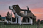 I think these people took the term "dog house" a bit literally..