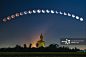 Lunar eclipse over Buddha