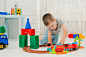 baby playing on the floor in a locomotive by Yuliya  Shangarey Shangarey on 500px