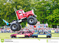 Monster truck editorial photo. Image of show, power, large - 21722461 : Photo about Famous Big Pete monster truck jumping cars at Wolverhampton show, England.  July 2011. - 21722461