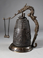 A Chinese bronze bell on stand with Gong.  The bell is finely molded with dragons and nymphs with one line inscription with original dragon shape stand and gong. Height: 11.5, circa 20th century.@北坤人素材