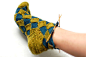 http://www.domesticrafts.com/Clog/CategoryView,category,Socks,Entrelac.aspx