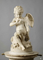 Seated Cupid. 1757. Etienne Maurice Falconet.  French 1716-1791. marble.