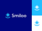 其中可能包括：the logo for smile is shown in blue and white