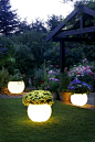 Paint glow in the dark paint on plant potters for around the edge of the garden or patio: 