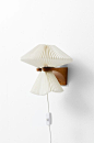 Le Klint wall lamp in pine wood produced by Le Klint in Denmark