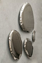 Creative studio Zieta have designed TAFLA, a modular collection of mirrors made from steel that have a unique, bionic form.