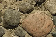 圆的石头铺路材料。质地,背景。