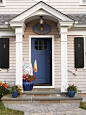 Pick a bold door color and paint it with a semigloss or glossy paint.: 