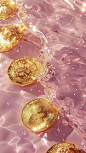 This may contain: five gold bitcoins are floating in the water