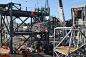 KSC-20161130-PH_DNG01_0023 : A crane lifts the Core State Inter-tank Umbilical (CSITU) for NASA's Space Launch System &#;40SLS&#;41 at the Launch Equipment Test Facility at the agency's Kennedy Space Center in Florida. The CSITU will be attached t