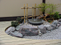 Balcony in London : Small balcony over looking London's skyline. Simple Japanese design, incorporating SHOJI Trellis and a water basin arrangement.