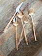 Glowing with rosy warmth, this luxe yet practical flatware set is electroplated in the gold-copper alloy known as rose gold. Sophisticated utensils have slender, smoothly rounded handles that feel lovely in the hand, adding a special glow to everyday dini
