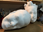 white heads by Sculptor Al Henderson