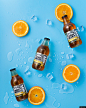 啤酒 饮料 酒精 瓶 橙色 柑橘类水果 美食摄影图片图片壁纸
