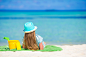 Adorable little girl in hat at beach during summer vacation by Dmitry Travnikov on 500px