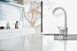 Close up of modern kitchen faucet and sink
