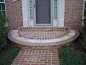 semi-circular brick step/entrance