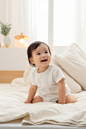 mca5259_Asian_baby_sitting_on_bed_happy_bright_room_ramie_cotto_4