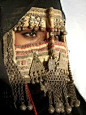 Yemeni lady. Reminds me of what ladies in Southern Saudi wear