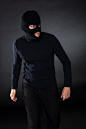 Thief wearing a balaclava