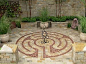 Pavior labyrinth - such wonderful stone colours and enclosed in a space which almost begs you to relax.