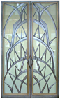 Art Deco style glass doors, created by Eric David Laxman for a penthouse apartment in New York City with spectacular views of Manhattan, including the Chrysler Building. architecture, design: 