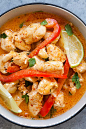 Spicy chicken curry with red curry sauce with coconut milk, served in a bowl.