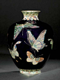 A CLOISONNÉ VASE SIGNED ON A SILVER TABLET KINUNKEN ZO, MEIJI PERIOD (LATE 19TH CENTURY) Worked in various thicknesses of silver wire and coloured cloisonné enamels on a deep blue ground with...