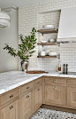 Subway tile done right!  Wood kitchen cabinets with marble countertops and mosaic tiles #kitchen #subwaytile
