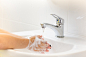 selective-focus-tap-water-children-washing-hands-with-soap-running-water-bathroom-tap_42667-988