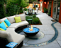 California Cool : The vibrant renovation of this garden reflects the spirit of its owner. A walled front courtyard features eye-catching color combinations and a zen like rock fountain. Packed with fun, the narrow