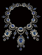 Prince Dimitri Penned the Most Glamorous Family Scrapbook You’ll Ever Read | Galerie 这套重要的项链和耳环套件曾经属于希腊和丹麦的尤金妮公主。她在1953年伊丽莎白二世女王加冕典礼上戴过它。它被设计成由11个簇组成的链，每个簇在椭圆形蓝宝石边框中镶有椭圆形蓝宝石，并由钻石赃物框住。
照片：由RIZZOLI提供 _灵感-珠宝首饰_T20201111 #率叶插件，让花瓣网更好用_http://ly.jiuxihuan.net/