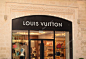 PALMA, MALLORCA - JULY 29, 2015: The logo of the brand "Louis Vuitton"