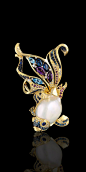 Pendant-Brooch - 18k yellow and white gold, baroque pearl, diamonds, blue diamonds, purple diamonds, blue sapphires, topaz, and amethysts.: