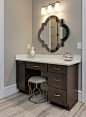 Example of a large transitional master gray floor bathroom design in Raleigh with raised-panel cabinets, medium tone wood cabinets, gray walls, an undermount sink, quartz countertops, a hinged shower door and white countertops
