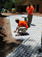 As Kyle is completing the edge of the parking pad, Rhett uses the tamp on that which has been laid. This must be done before the SOIL 3 can be applied. Installation and picture by Inspired Landscape Services. Pavers supplied by Super-Sod.