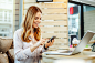 Young woman texting on the phone in a cafe by Milenko Đilas on 500px