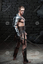 gladiator-sword-posing-full-length-side-view-portrait-young-attractive-warrior-muscular-body-dark-background-42959123.jpg (955×1300)