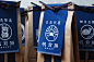 Anything : NOSIGNER designed the package of "Anything," the brand of traditional-Japanese-style aprons. The paper bag, originally used for rice, illustrated with the apron provides an actual image of how to wear it and its lineup.