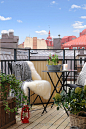 80平自然系二居北欧风格家居阳台休闲椅茶几植物装修效果图