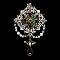 This enamelled gold brooch is set with a brilliant-cut diamond, garnets, emeralds, rubies and an amethyst drop and hung with green glass beads and pearls. This is the perfect example of the ornate style which was in vogue in the mid-Ninetee@北坤人素材