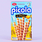 Picola Cheese Tart Egg Rolls : Taste the sweet and tart flavors of freshly-baked cheese tarts as you munch on these treats! These rolled sticks are made of langue de chat egg roll biscuits filled with cheese cream chocolate.
