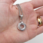 Silver Love Knot chainmail pendant necklace : The chainmail love knot pendant necklace is a simple and understated necklace that is great for work or play, and women of all ages. Shiny